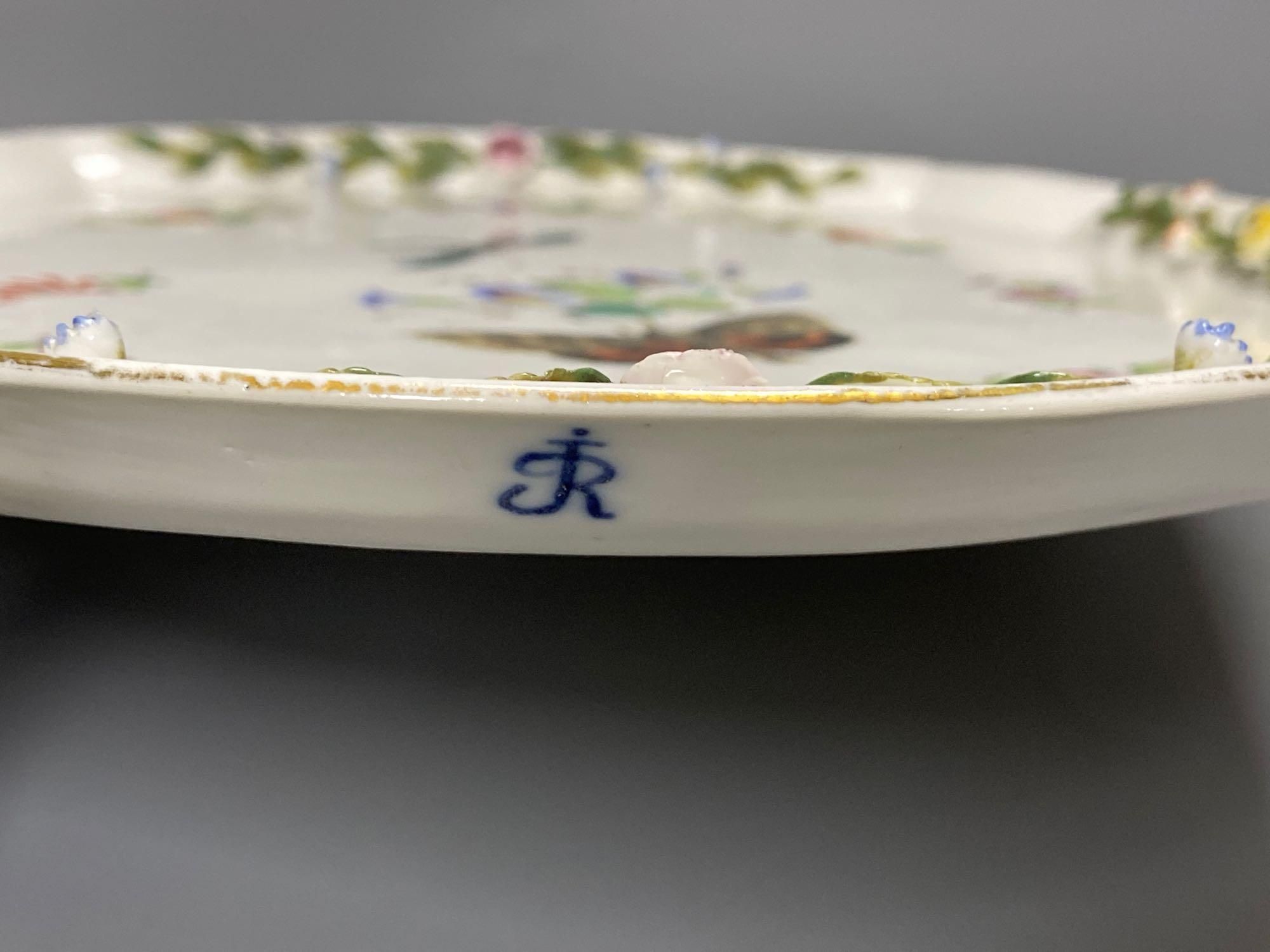 A late 19th century French porcelain flower encrusted cafe au lait set, on stand, stand 27cm